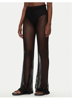 Guess Spodnie palazzo E5GB02 Z3N30 Czarny Palazzo Fit ze sklepu MODIVO w kategorii Spodnie damskie - zdjęcie 181033775