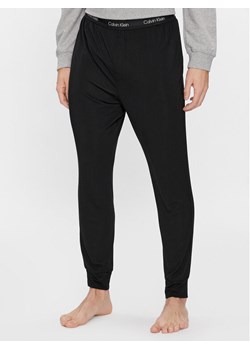 Calvin Klein Underwear Spodnie piżamowe 000NM2235A Czarny Regular Fit ze sklepu MODIVO w kategorii Piżamy męskie - zdjęcie 181035245