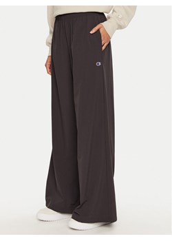 Champion Spodnie dresowe 117472 Czarny Wide Leg ze sklepu MODIVO w kategorii Spodnie damskie - zdjęcie 181036446