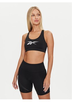 Reebok Top Train BL Bra 100075674 Czarny Slim Fit ze sklepu MODIVO w kategorii Bluzki damskie - zdjęcie 181038416