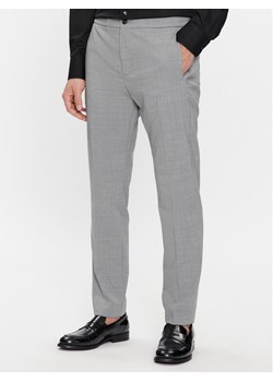 Tommy Hilfiger Spodnie materiałowe Dc Chelsea Po Travel Wool MW0MW33930 Szary Regular Fit ze sklepu MODIVO w kategorii Spodnie męskie - zdjęcie 181038435