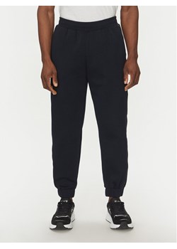 EA7 Emporio Armani Spodnie dresowe 7M000545 AF12660 UB102 Granatowy Modern Fit ze sklepu MODIVO w kategorii Spodnie męskie - zdjęcie 181038726