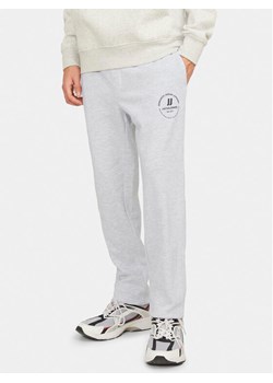 Jack&Jones Spodnie dresowe Gordon 12249904 Biały Regular Fit ze sklepu MODIVO w kategorii Spodnie męskie - zdjęcie 181039036