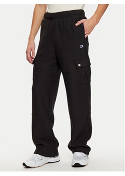 Champion Spodnie dresowe 220710 Czarny Loose Fit ze sklepu MODIVO w kategorii Spodnie męskie - zdjęcie 181039316