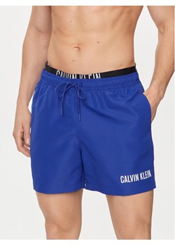 Calvin Klein Swimwear Szorty kąpielowe KM0KM00992 Granatowy Regular Fit ze sklepu MODIVO w kategorii Kąpielówki - zdjęcie 181039765