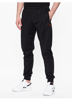 Ellesse Spodnie dresowe Bertoni SHR04351 Czarny Regular Fit ze sklepu MODIVO w kategorii Spodnie męskie - zdjęcie 181041245