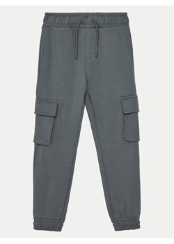 NAME IT Spodnie dresowe 13224991 Szary Relaxed Fit ze sklepu MODIVO w kategorii Spodnie chłopięce - zdjęcie 181043065