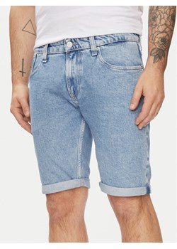 Tommy Jeans Szorty jeansowe Ronnie DM0DM19154 Niebieski Slim Fit ze sklepu MODIVO w kategorii Spodenki męskie - zdjęcie 181043708