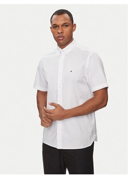 Tommy Hilfiger Koszula 1985 MW0MW33810 Biały Slim Fit ze sklepu MODIVO w kategorii Koszule męskie - zdjęcie 181043905