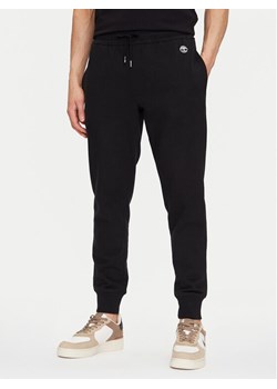 Timberland Spodnie dresowe TB0A5V5Q Czarny Regular Fit ze sklepu MODIVO w kategorii Spodnie męskie - zdjęcie 181044417