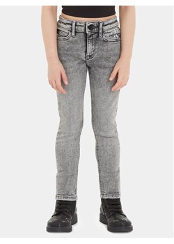 Calvin Klein Jeans Jeansy IG0IG02155 Szary Skinny Fit ze sklepu MODIVO w kategorii Spodnie dziewczęce - zdjęcie 181045256