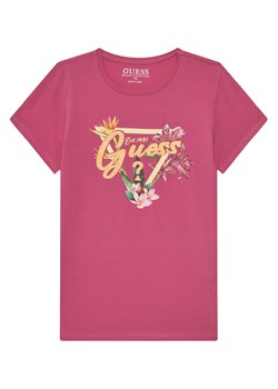 Guess T-Shirt J5GI16 K6YW4 Różowy Regular Fit ze sklepu MODIVO w kategorii Bluzki dziewczęce - zdjęcie 181050087