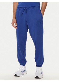 adidas Spodnie dresowe ALL SZN IW1186 Niebieski Regular Fit ze sklepu MODIVO w kategorii Spodnie męskie - zdjęcie 181052097
