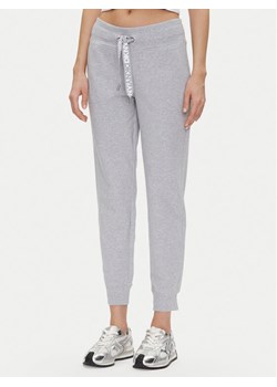DKNY Sport Spodnie dresowe DP5P3496 Szary Regular Fit ze sklepu MODIVO w kategorii Spodnie damskie - zdjęcie 181052428