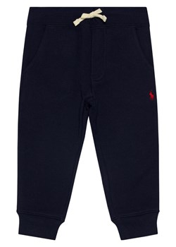 Polo Ralph Lauren Spodnie dresowe Core Replen 323720897003 Granatowy Regular Fit ze sklepu MODIVO w kategorii Spodnie chłopięce - zdjęcie 181053038