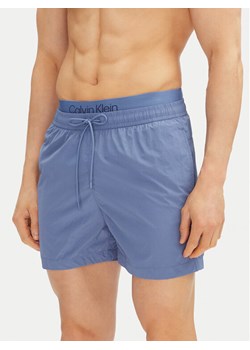 Calvin Klein Swimwear Szorty kąpielowe KM0KM01104 Niebieski Regular Fit ze sklepu MODIVO w kategorii Kąpielówki - zdjęcie 181053676