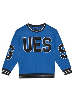 Guess Bluza L5GQ04 KA6R4 Niebieski Regular Fit ze sklepu MODIVO w kategorii Bluzy chłopięce - zdjęcie 181053755