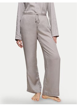 Triumph Spodnie piżamowe Silky Sensuality 10221174 Szary Relaxed Fit ze sklepu MODIVO w kategorii Piżamy damskie - zdjęcie 181054006