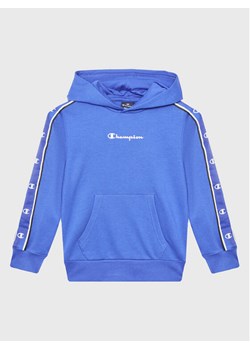 Champion Bluza 306320 Niebieski Regular Fit ze sklepu MODIVO w kategorii Bluzy chłopięce - zdjęcie 181054709