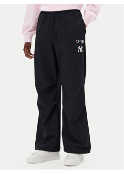 Champion Spodnie dresowe 117977 Czarny Loose Fit ze sklepu MODIVO w kategorii Spodnie damskie - zdjęcie 181057237