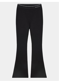 Calvin Klein Jeans Spodnie materiałowe Logo Tape IG0IG02292 Czarny Flare Fit ze sklepu MODIVO w kategorii Spodnie dziewczęce - zdjęcie 181058975