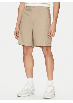 Nike Szorty materiałowe FN3517 Brązowy Standard Fit ze sklepu MODIVO w kategorii Spodenki męskie - zdjęcie 181059097