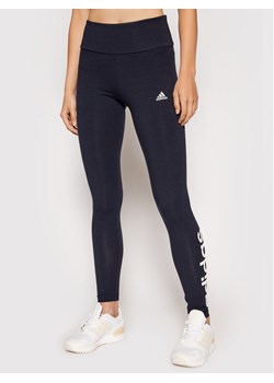 adidas Legginsy Essentials Logo H07781 Granatowy Extra Slim Fit ze sklepu MODIVO w kategorii Spodnie damskie - zdjęcie 181059245