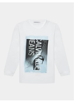 Calvin Klein Jeans Bluzka Photograph IB0IB01987 Biały Loose Fit ze sklepu MODIVO w kategorii T-shirty chłopięce - zdjęcie 181059519