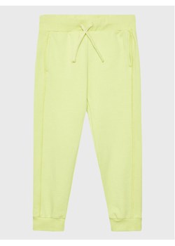 United Colors Of Benetton Spodnie dresowe 3UHRCF02N Żółty Regular Fit ze sklepu MODIVO w kategorii Spodnie dziewczęce - zdjęcie 181060136