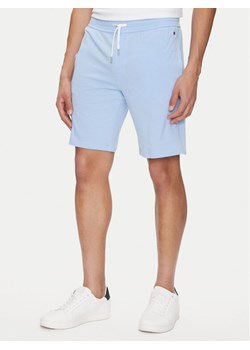 Tommy Hilfiger Szorty sportowe UM0UM03364 Błękitny Regular Fit ze sklepu MODIVO w kategorii Spodenki męskie - zdjęcie 181060898