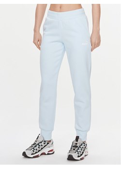 Puma Spodnie dresowe Ess 586841 Niebieski Regular Fit ze sklepu MODIVO w kategorii Spodnie damskie - zdjęcie 181061345