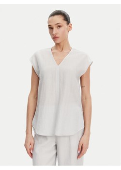 Calvin Klein Bluzka K20K208210 Błękitny Regular Fit ze sklepu MODIVO w kategorii Bluzki damskie - zdjęcie 181062708