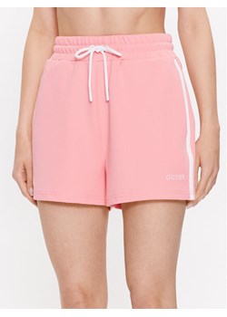 Guess Szorty sportowe Signature V3GD00 KBO62 Różowy Loose Fit ze sklepu MODIVO w kategorii Szorty - zdjęcie 181063286