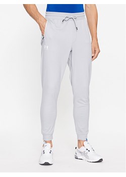 Under Armour Spodnie dresowe Sportstyle Tricot Jogger 1290261 Szary Loose Fit ze sklepu MODIVO w kategorii Spodnie męskie - zdjęcie 181063647
