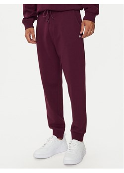United Colors Of Benetton Spodnie dresowe 342ZUF01B Fioletowy Regular Fit ze sklepu MODIVO w kategorii Spodnie męskie - zdjęcie 181063897
