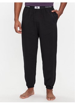 Calvin Klein Underwear Spodnie piżamowe 000NM2514E Czarny Regular Fit ze sklepu MODIVO w kategorii Piżamy męskie - zdjęcie 181064246