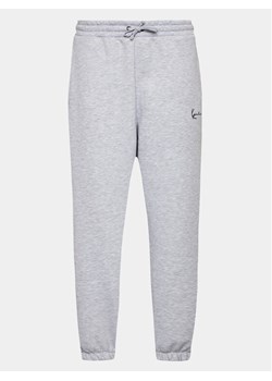 Karl Kani Spodnie dresowe Small Signature Essential 6006899 Szary Regular Fit ze sklepu MODIVO w kategorii Spodnie męskie - zdjęcie 181064256