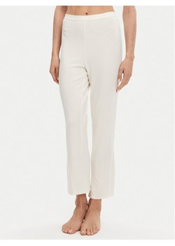 Calvin Klein Underwear Spodnie piżamowe 000QS7285E Écru Slim Fit ze sklepu MODIVO w kategorii Piżamy damskie - zdjęcie 181065018