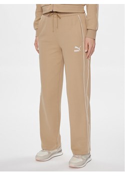 Puma Spodnie dresowe T7 624212 Beżowy Relaxed Fit ze sklepu MODIVO w kategorii Spodnie damskie - zdjęcie 181066765