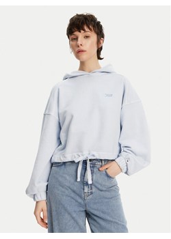 Tommy Jeans Bluza DW0DW20314 Niebieski Relaxed Fit ze sklepu MODIVO w kategorii Bluzy damskie - zdjęcie 181067439