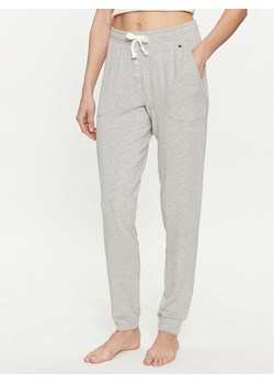 Tommy Hilfiger Spodnie dresowe UW0UW05192 Szary Slim Fit ze sklepu MODIVO w kategorii Spodnie damskie - zdjęcie 181067565