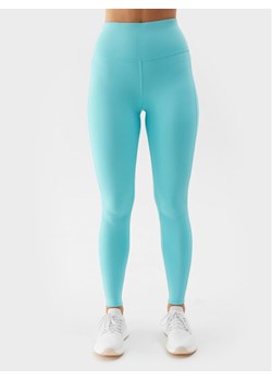 4F Legginsy 4FWSS24TFTIF232 Niebieski Slim Fit ze sklepu MODIVO w kategorii Spodnie damskie - zdjęcie 181068139
