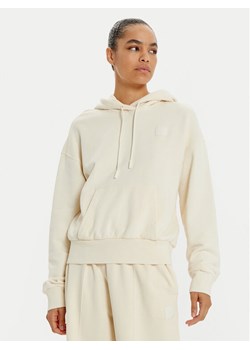 Lacoste Bluza SF2673 Écru Oversize ze sklepu MODIVO w kategorii Bluzy damskie - zdjęcie 181068305