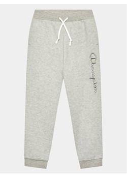 Champion Spodnie dresowe 306345 Szary Regular Fit ze sklepu MODIVO w kategorii Spodnie chłopięce - zdjęcie 181069647