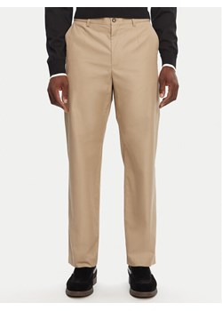 Dolce&Gabbana Spodnie materiałowe GV5ZHT FU5SW M0868 Beżowy Regular Fit ze sklepu MODIVO w kategorii Spodnie męskie - zdjęcie 181070647