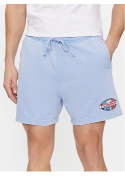 Tommy Jeans Szorty sportowe Tjm Arch Graphic Beach Short Ext DM0DM19167 Niebieski Regular Fit ze sklepu MODIVO w kategorii Spodenki męskie - zdjęcie 181071196