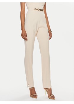 Marciano Guess Spodnie materiałowe 4GGB13 7074A Beżowy Regular Fit ze sklepu MODIVO w kategorii Spodnie damskie - zdjęcie 181071606