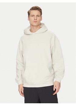adidas Bluza Premium Essentials JD3299 Beżowy Loose Fit ze sklepu MODIVO w kategorii Bluzy męskie - zdjęcie 181072306