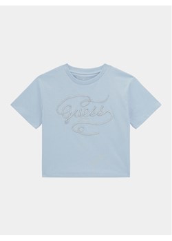 Guess T-Shirt J4RI18 K8HM4 Błękitny Regular Fit ze sklepu MODIVO w kategorii Bluzki dziewczęce - zdjęcie 181073458