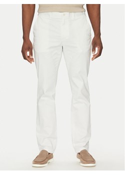 Tommy Hilfiger Chinosy Denton MW0MW37873 Biały Slim Fit ze sklepu MODIVO w kategorii Spodnie męskie - zdjęcie 181074787